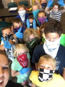 Kids masked with bandanna